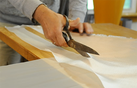 Wrapping Bias Cut Cloth Around the Coaming Lip | Guillemot 