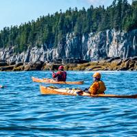 sea kayaking in wood kayaks near ironbound